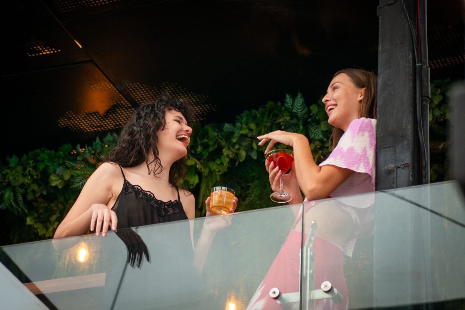 Above Eleven guests enjoying drinks